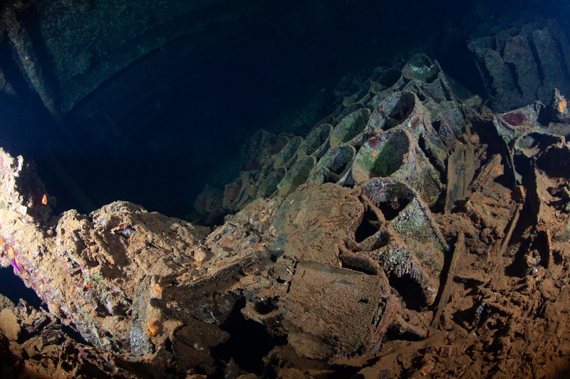 Corroded cargo and debris lie scattered inside the hold of the Umbria, Port Sudan.